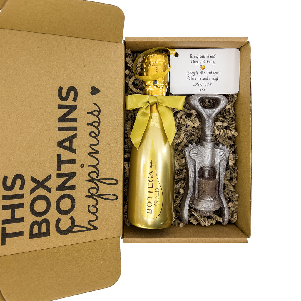 Close-up view of Bottega Gold Prosecco 20cl bottle with an Italian Chocolate Corkscrew, neatly arranged in 'A Little Less Kindness, A Little Less Stress' gift box.