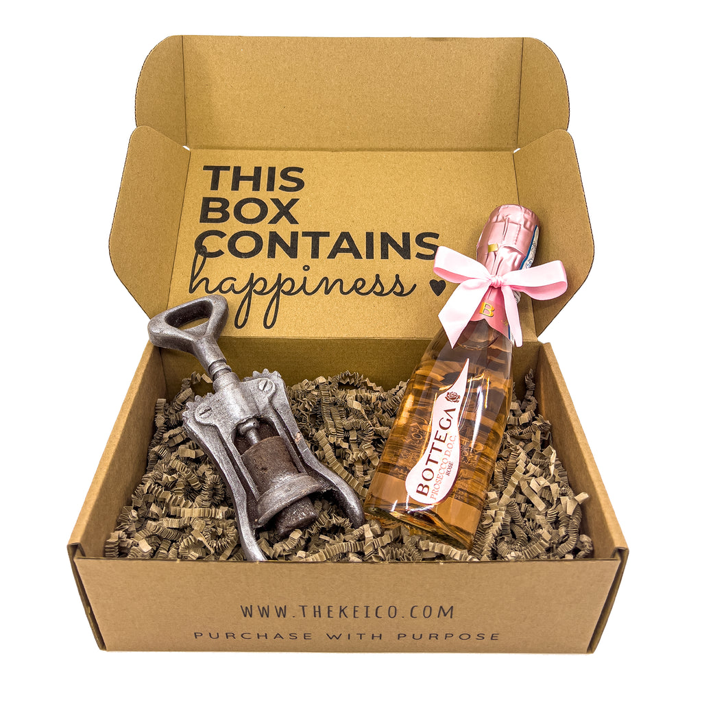 Image showcasing the Bottega Rosé Prosecco 20cl and a chocolate corkscrew, presented in a premium 'A Little Less Kindness, A Little Less Stress' gift box.