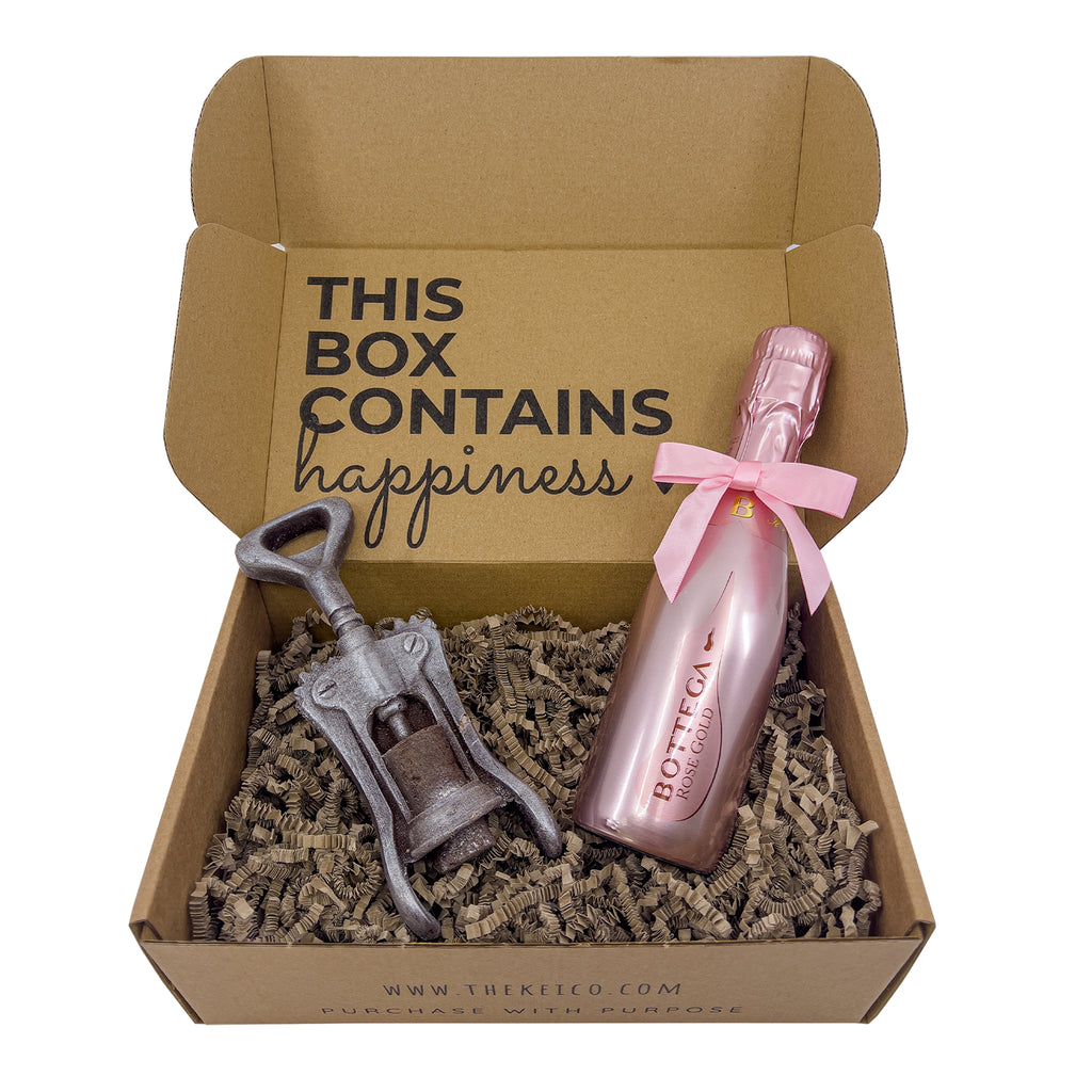Bottega Rose Gold Sparkling Wine 20cl with a life-sized chocolate corkscrew, beautifully packaged in a custom gift box.