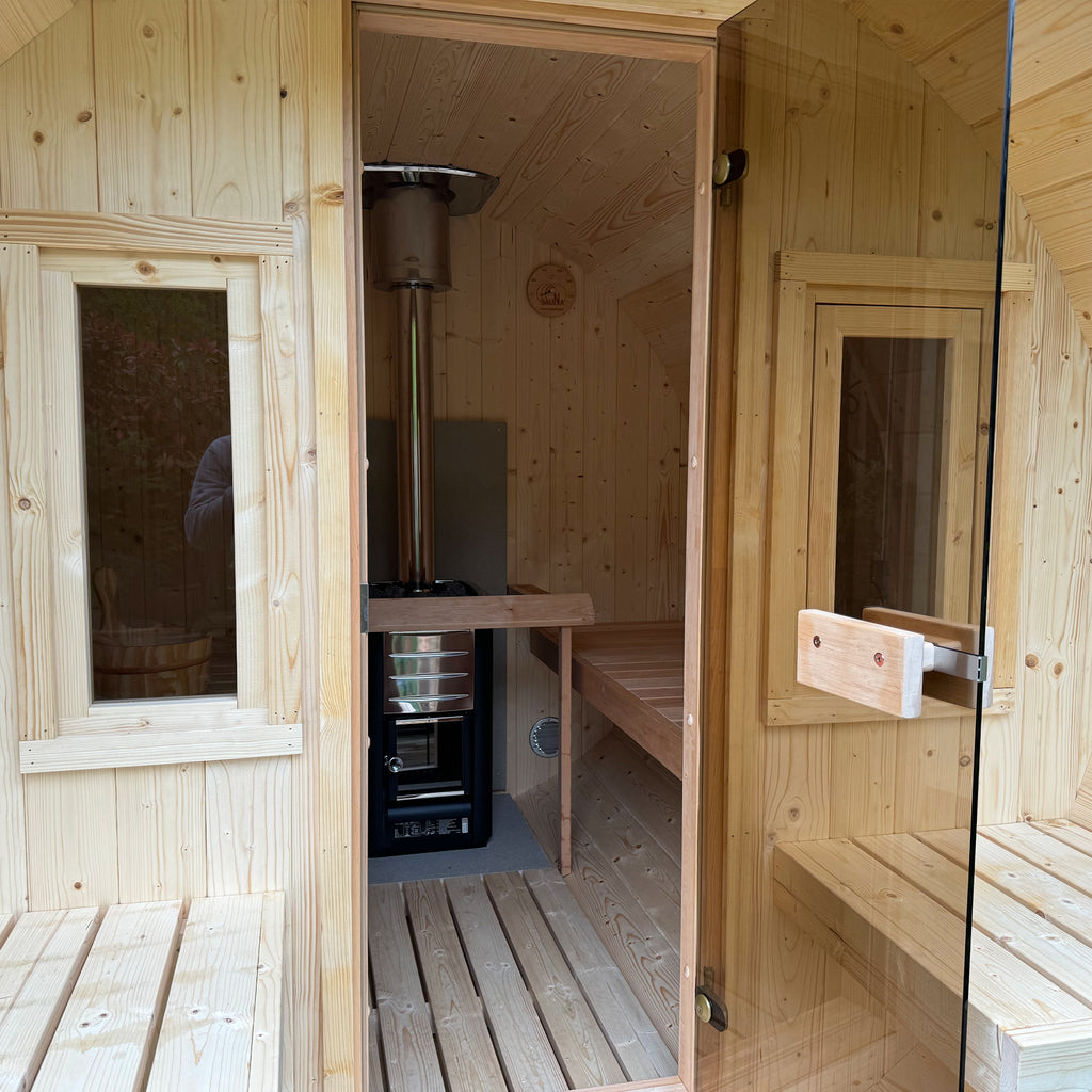 250 Outdoor Barrel Garden Sauna Interior with Harvia wood-burning Heater | KeiCo Wellness