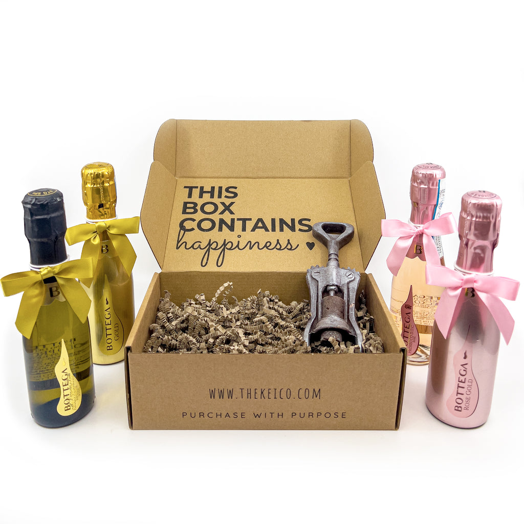Four variants of Bottega 20cl sparkling wines and an Italian Chocolate Corkscrew, artistically arranged inside a special gift box.
