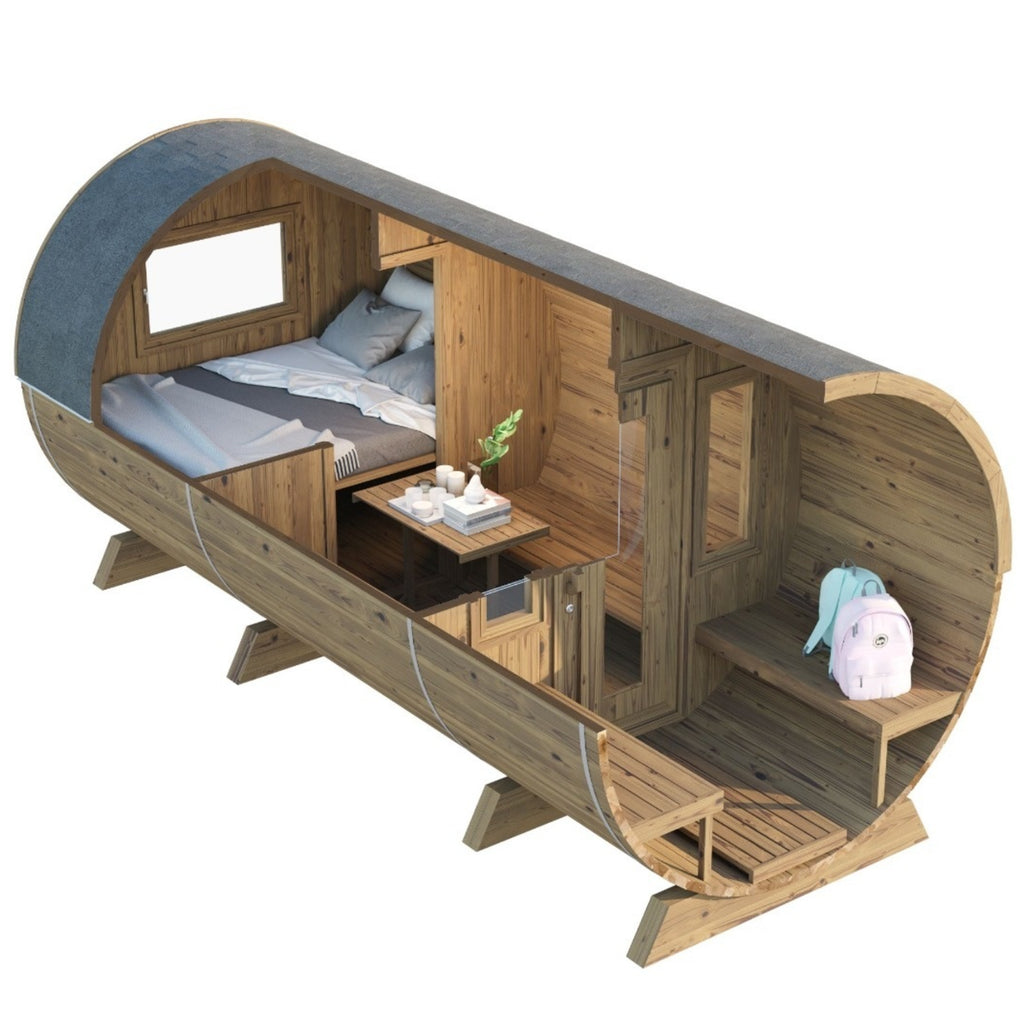 Inviting interior of the KeiCo Barrel Glamping Pod with twin benches and space-saving table.
