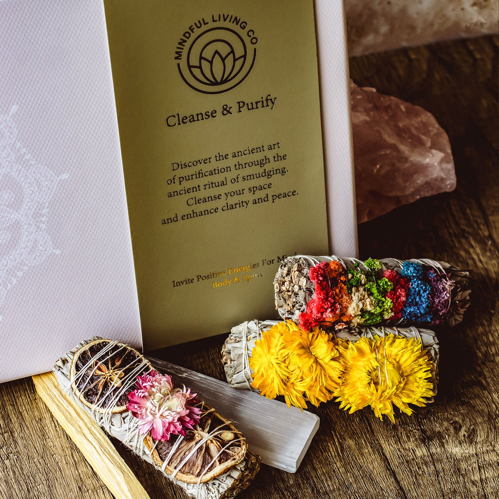 White sage bundle and palo santo wood for cleansing rituals