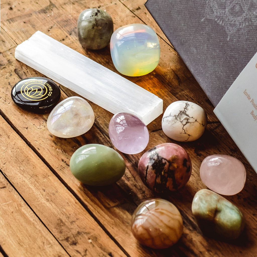 Gemstone discovery kit with polished crystals and info card