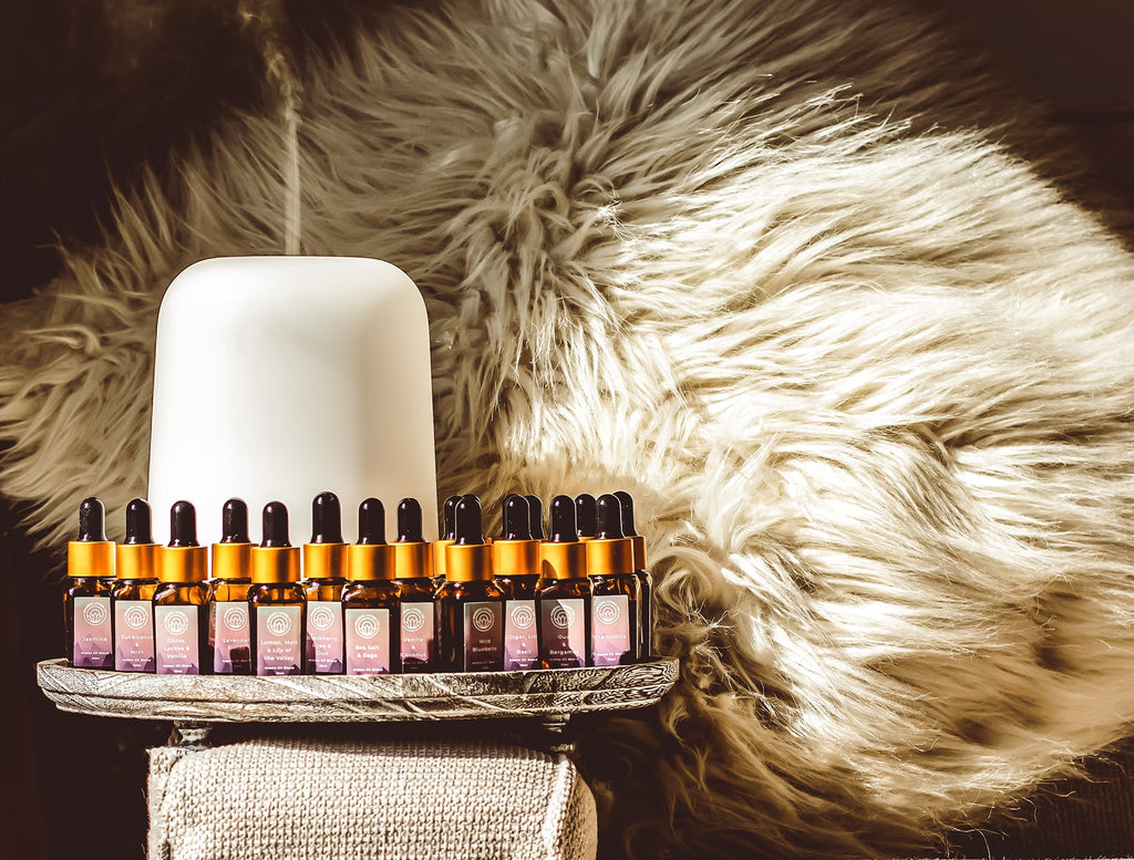 Ultrasonic diffuser with citrus, floral and revitilise oils