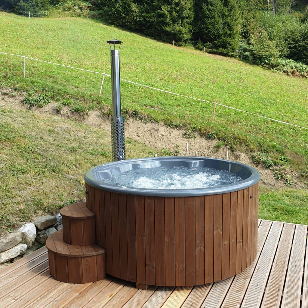 Close-up view of the Thermowood finish on the KeiCo Deluxe Hot Tub, illustrating the natural elegance and durability of the product.