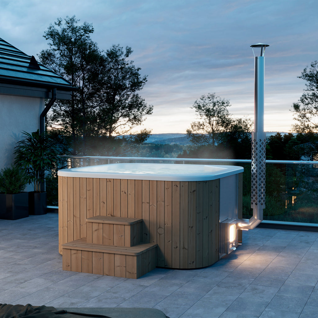 Eco-friendly outdoor hot tub with integrated wood stove, perfect for sustainable living | KeiCo Wellness