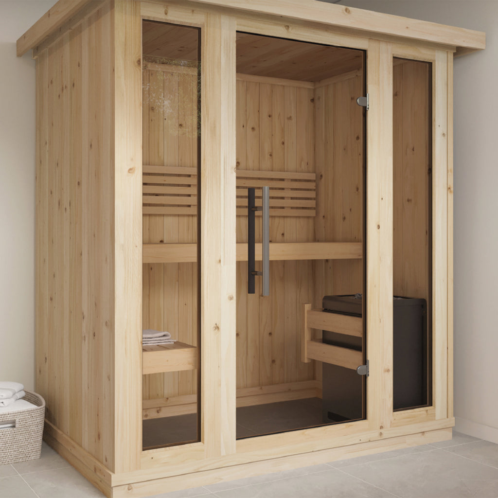 KC Indoor Solo Sauna installed in a light-filled wellness room with glass front door.