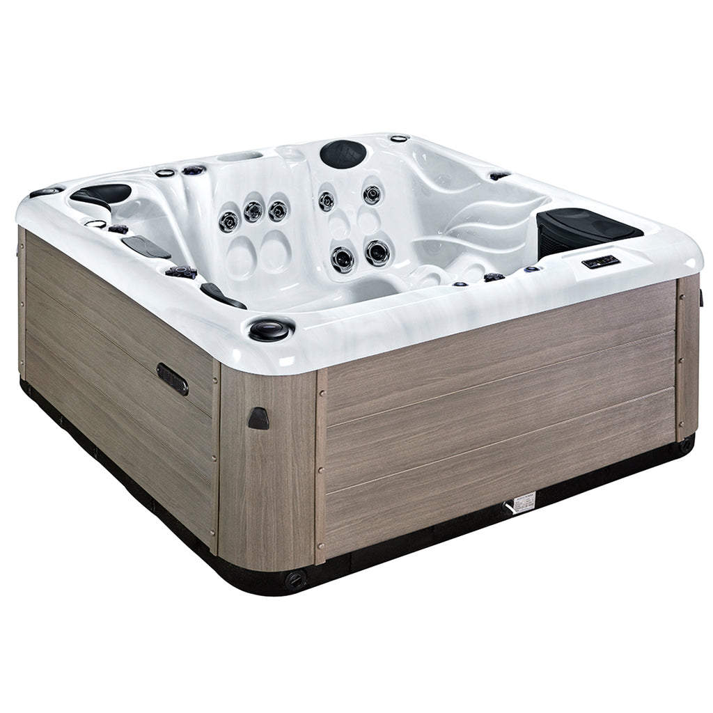 Relaxing in the KC-3 Harmony Spa - 5-Person Hot Tub, showcasing the 3 seats + 2 loungers layout.