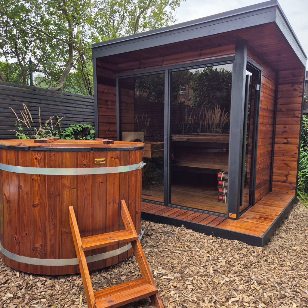 Luxury Kiki-Connect outdoor wellness suite featuring handcrafted cedar sauna and cold plunge, designed for ultimate mind-body restoration.