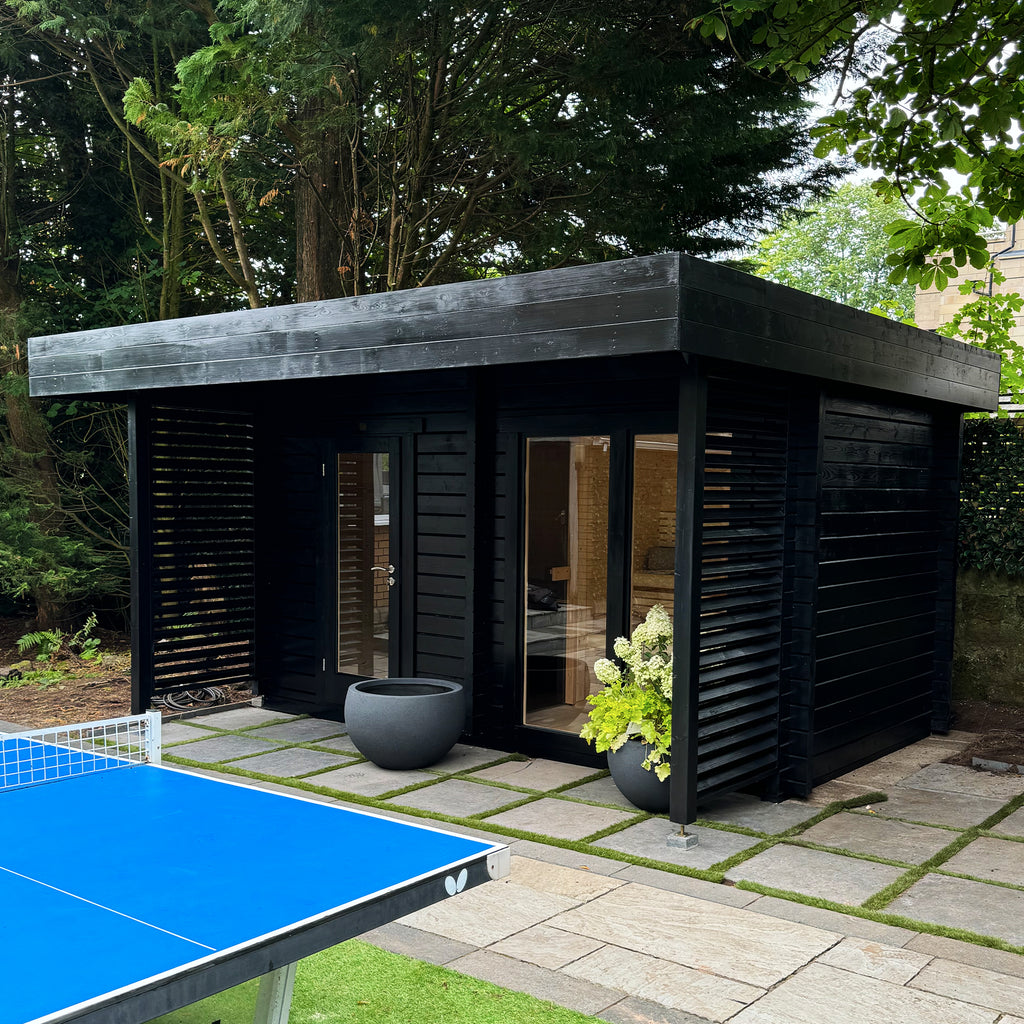 Exterior of KC Kaldera wellness retreat with 4m² sauna and matching cold plunge room