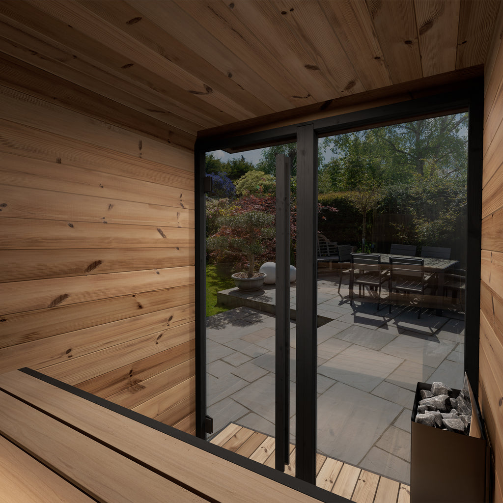 KeiCo's Premium Kiki Outdoor Sauna - Core Model looking out onto a modern English garden. 
