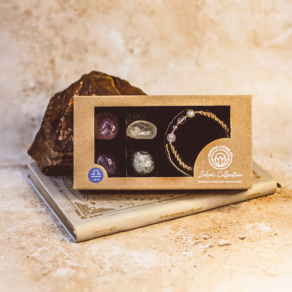 Close-up of Libra energy card with symbolic artwork and balance-focused affirmation