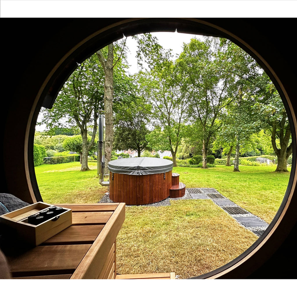 Elegant Circle Glass Window on KeiCo 'Raiki' Sauna - Natural Light and Panoramic Outdoor Views