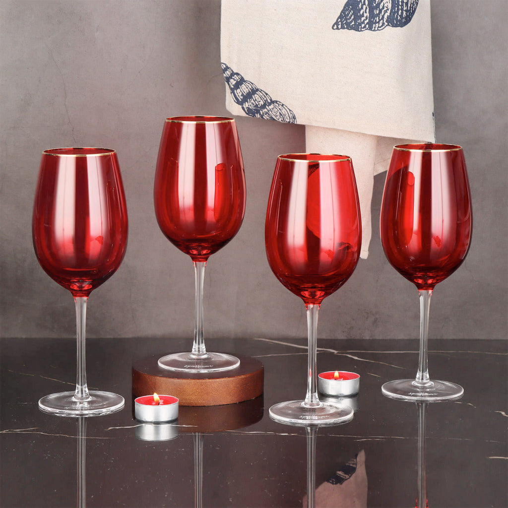 A stunning set of four Sparkleware large red wine glasses, elegantly rimmed with gold, Luxury Kitchen image. The KeiCo