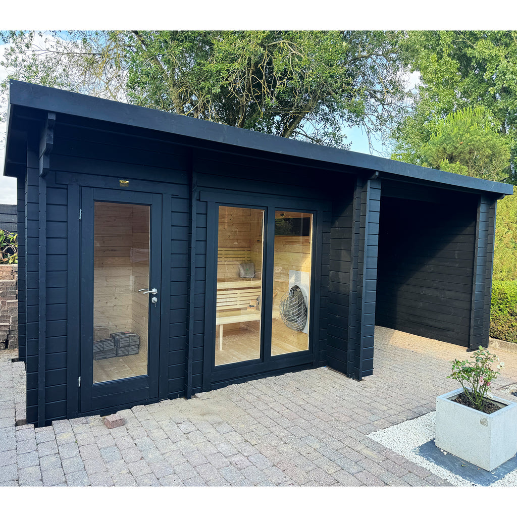 Exterior view of KeiCo Garden Spa Retreat with timber cladding and panoramic sauna window in natural setting