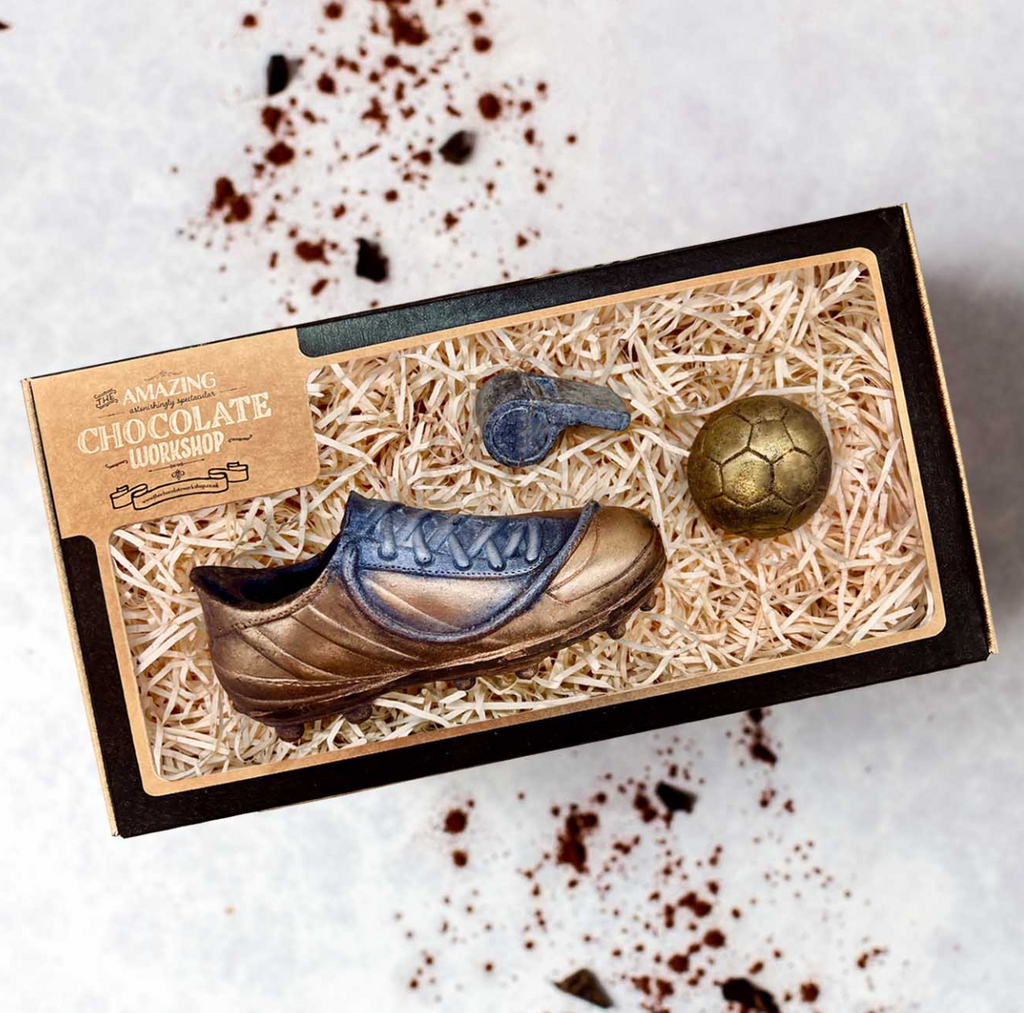 Handcrafted vegan chocolate football boot, whistle, and ball in gift box