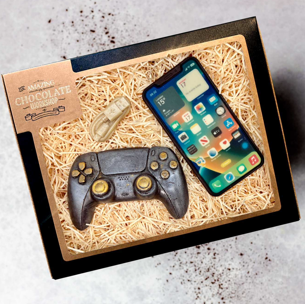 Vegan chocolate tech gift set with iPhone, controller, and USB cable