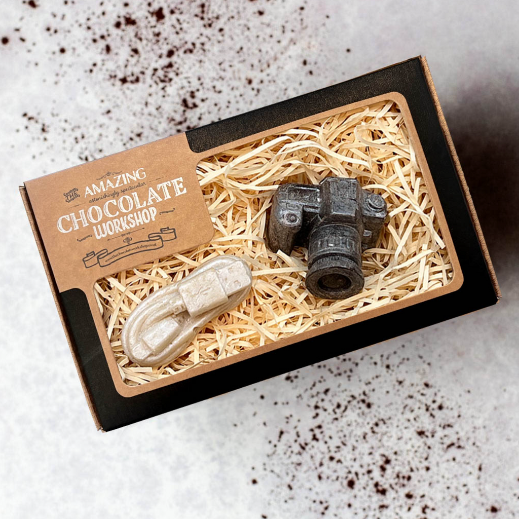 Vegan chocolate camera and charger cable gift set styled in presentation box