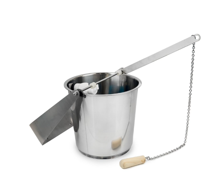 Metal bucket with a ladle and chain on a white background