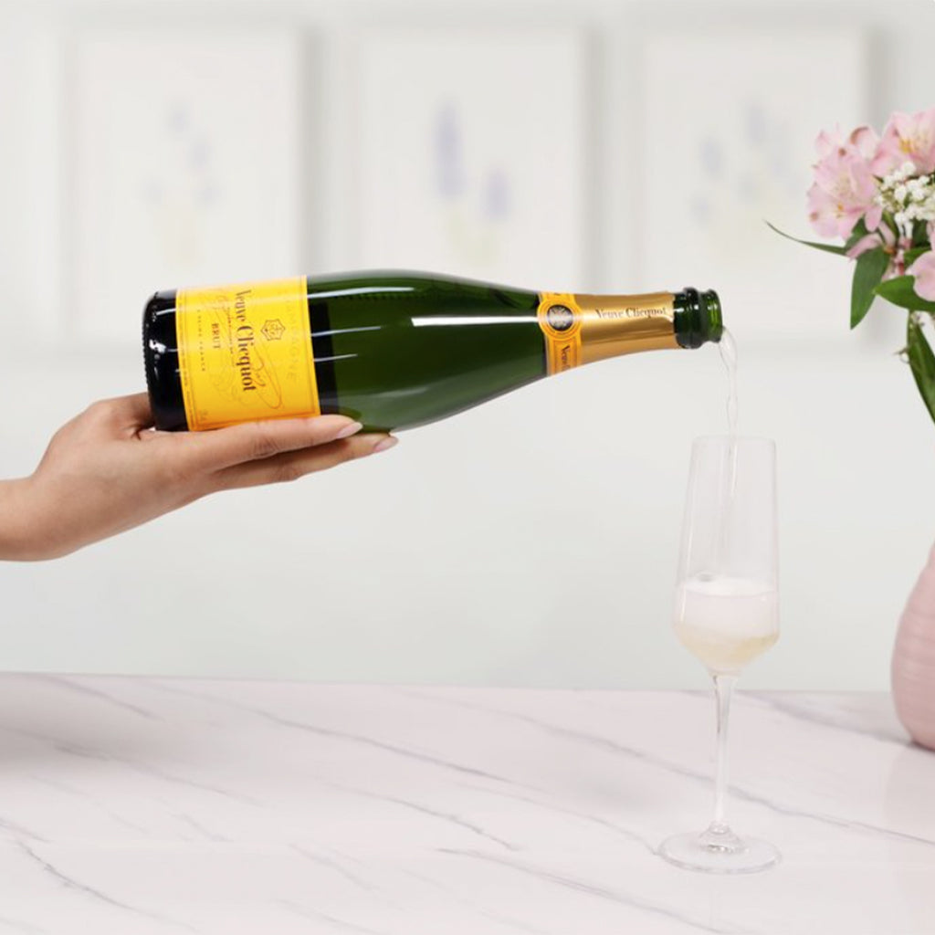 Veuve Clicquot Champagne pouring into Champagne Flute