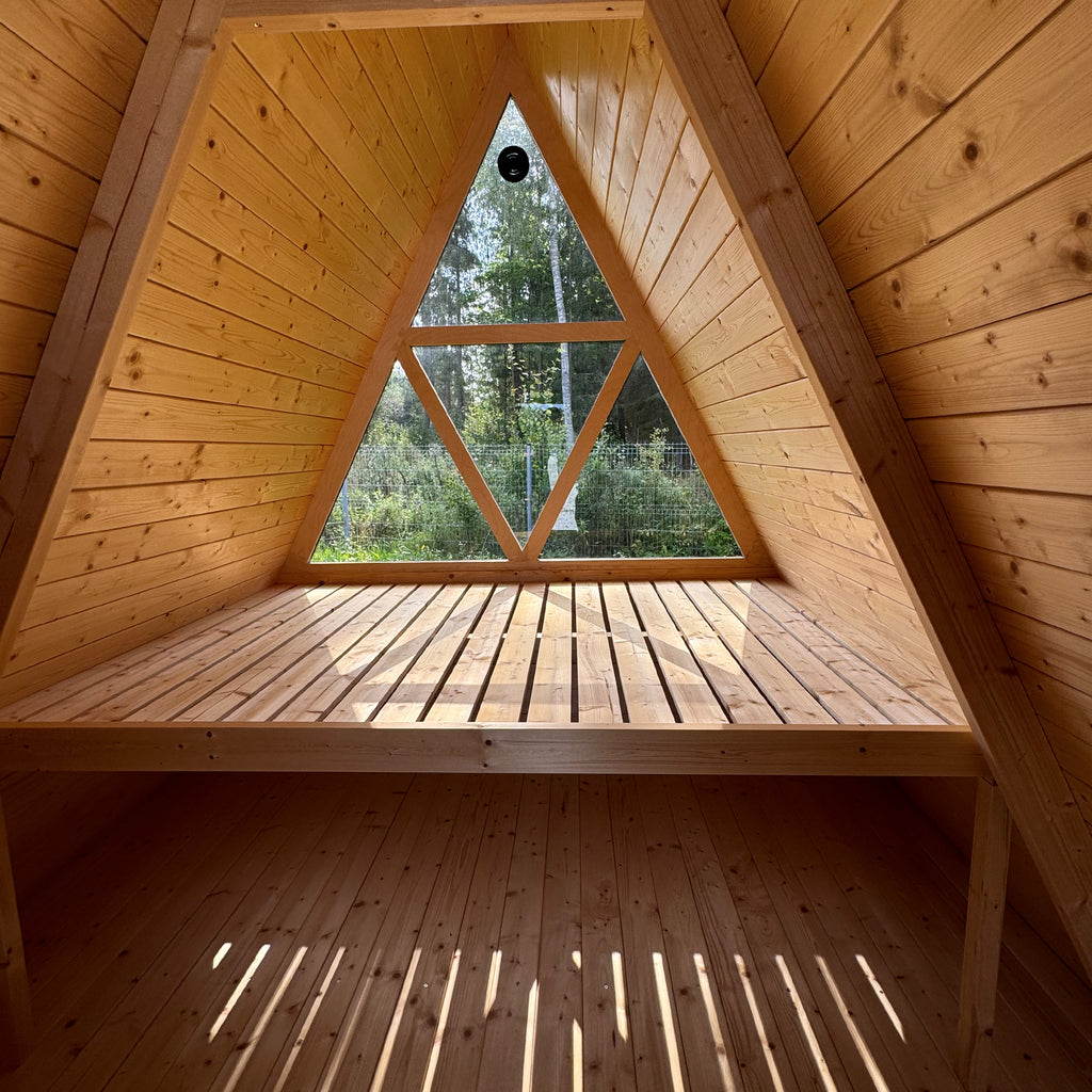 The KeiCo Wigwam Glamping Pod Interior Double Bed with rear glass panel design