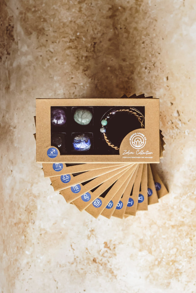 lat lay of entire Libra ritual set with packaging and included items on neutral linen