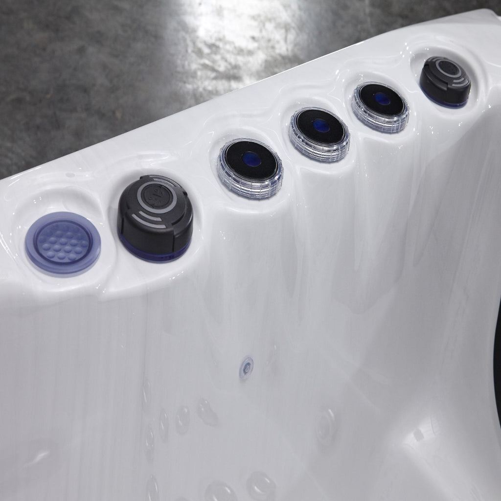 Profile view of the spa with grey composite side panel and Sterling Silver interior.