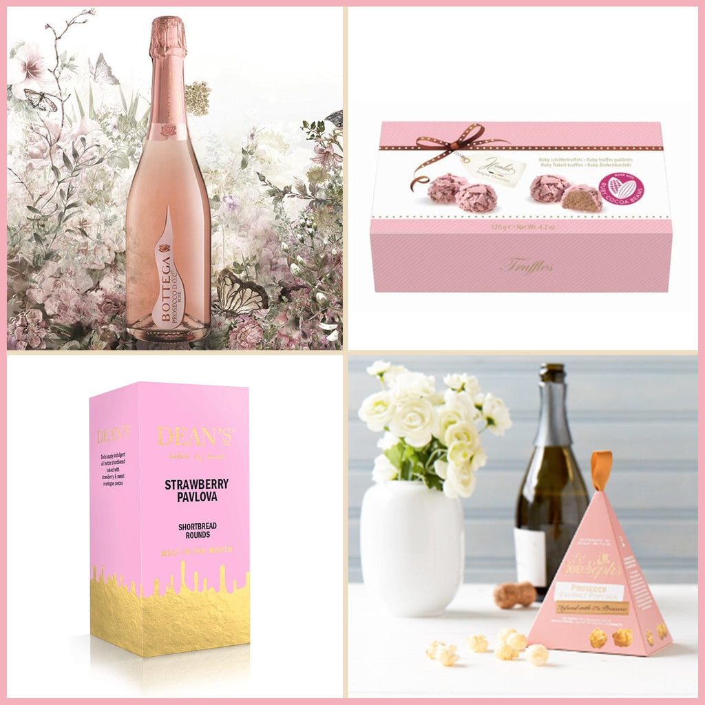 Luxury pink-themed hamper showcasing a selection of premium goodies such as Prosecco, truffles, and gourmet biscuits.
