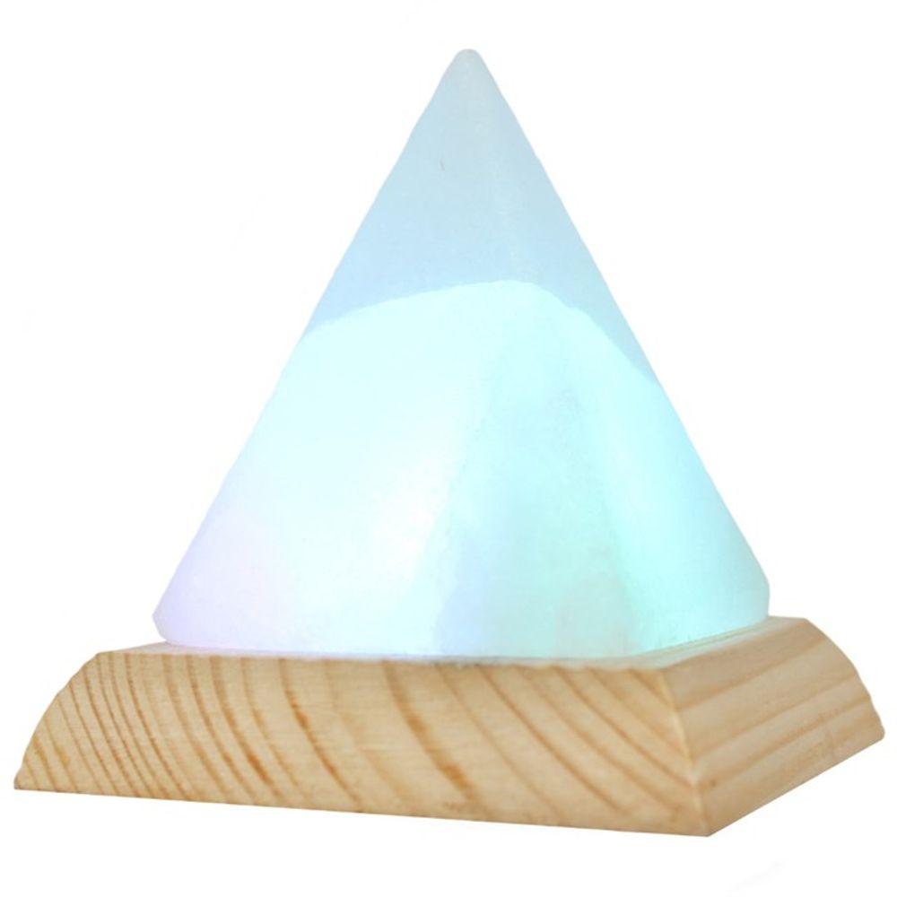 KeiCo’s Pyramid White USB Salt Lamp, emanating a gentle glow amidst a serene setting