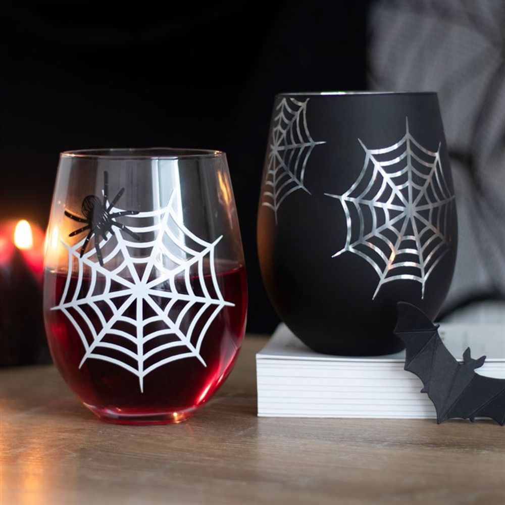 KeiCo's Spider and Web Stemless Wine Glasses filled with deep red wine, capturing the Halloween essence.