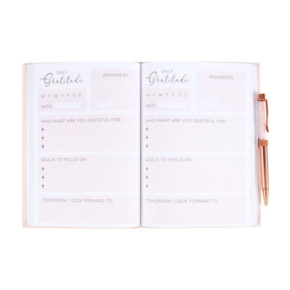 A5 sized journal with intuitive prompts for tracking daily affirmations and thankfulness.