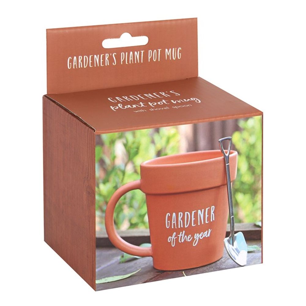 Artistic ceramic mug and teaspoon, celebrating the joy of gardening.